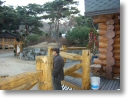 log house yangji 02 front 03 & owner.jpg